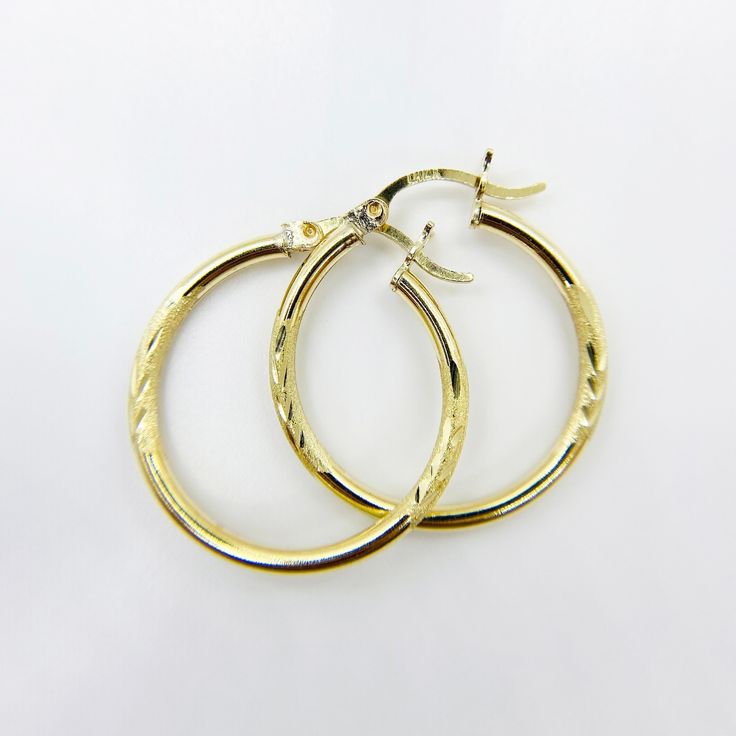 14k Gold Round Circle Simple Classic Matt Plain Diamond Cut Hoop Earrings for Women * Metal : Real 14K Yellow Gold * Condition : Brand New * Finish : Polished * Style : 2mm Tube * Size : X Small (15.2mm) / Small (17.6mm) / Medium (20.6mm) / Large (25.3mm) * Weight : 1.2 ~ 2.1 gram This is an approximate size & weight. Please expect up to ±10% difference. * Processing time : 1~3 business days * Ships from California This is 100% Authentic 14k Gold. Not plated or filled. All of our items are brand Round Earrings Circles Gold, Yellow Gold Diamond Cut Hoop Earrings, Diamond Cut Round Hoop Earrings As Gift, Diamond Cut Gold Plated Hoop Earrings For Anniversary, Gold Diamond Cut Hoop Earrings, Small Hoop Gold Earrings Stamped 14k, Gold Hoop Earrings With Diamond Cut, 14k Stamped Yellow Gold Round Hoop Earrings, 14k Stamped Yellow Gold Hoop Earrings