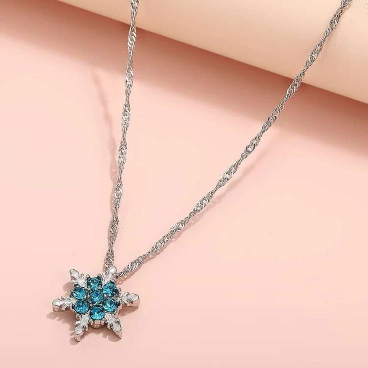 Snowflake Pendant Necklace -Measurements In Pics Pet Friendly Home Smoke Free Home Necklace Measurements, Snowflake Pendant, Pet Friendly Home, Blue And Silver, Womens Jewelry Necklace, Pet Friendly, Diamond Necklace, Color Blue, Jewelry Necklaces