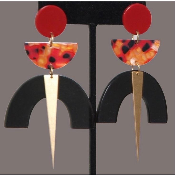 Statement Earrings Made With Cellulose Acetate,Accented With Long Triangle Raw Brass And Red Studs. Length:3.75” Krobo People, Krobo Beads, African Bracelets, Red Studs, Making Glass, African Earrings, Handmade African, Cellulose Acetate, African Beads