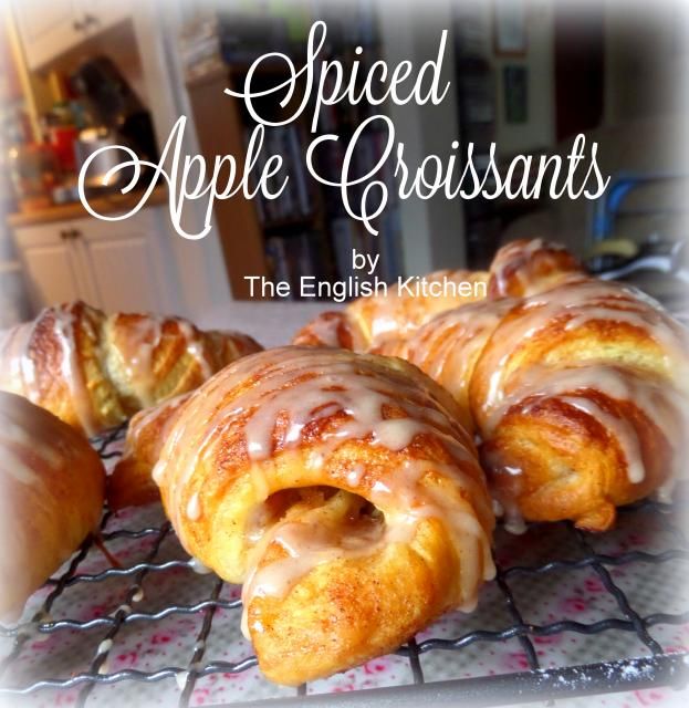 baked apple croissants on a cooling rack with the title spiced apple croissants by the english kitchen