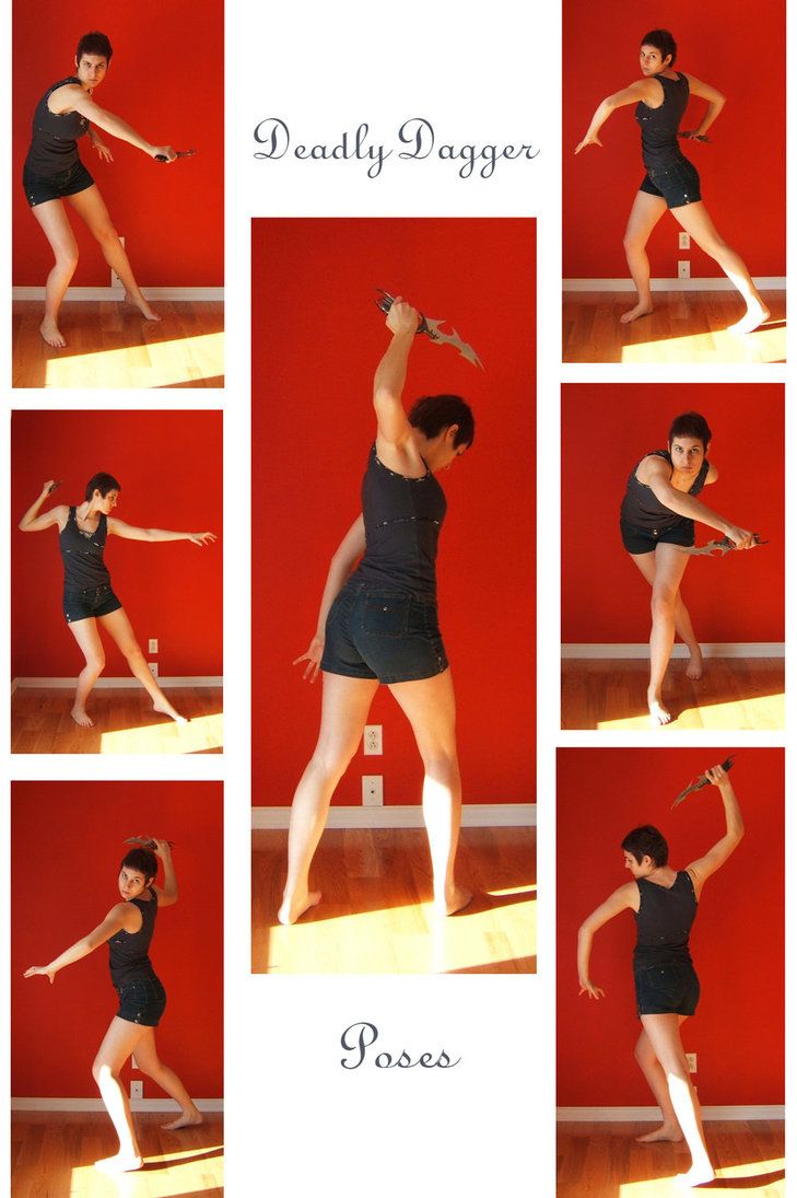 a woman in black shirt and shorts doing various poses on a wooden floor with red wall behind her