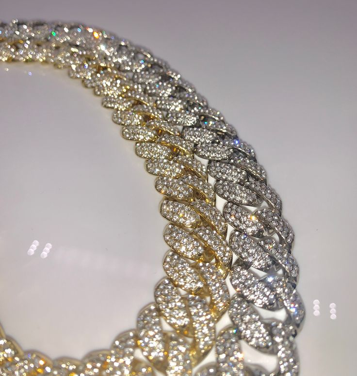 "THIS IS OUR TOP SELLING ITEM FOR 2 YEARS This 18mm Iced Cuban Chain is a luxurious piece put together with Gold and CZ Diamonds. We strive to offer the most exquisite pieces at the best prices in the game so don't hesitate when adding multiple chains to your cart. The perfect accessory to any outfit, casual or business, this piece will get many compliments when worn in public. Perfect to pair with any Watch, Bracelet, Ring or Pendant from our store^^ Size: Length- 18\" 20\" 24\" Width- 13mm Fin White Iced Out Chain Link Jewelry, Iced Out White Chain Link Jewelry, White Iced Out Chain Necklace, Iced Cuban Link Necklace For Gift, White Curb Chain Jewelry For Anniversary, Iced Gold Cuban Link Jewelry, Gold Iced Out Jewelry For Gift, Gold Iced Cuban Link Jewelry, Gold Iced Jewelry Gift