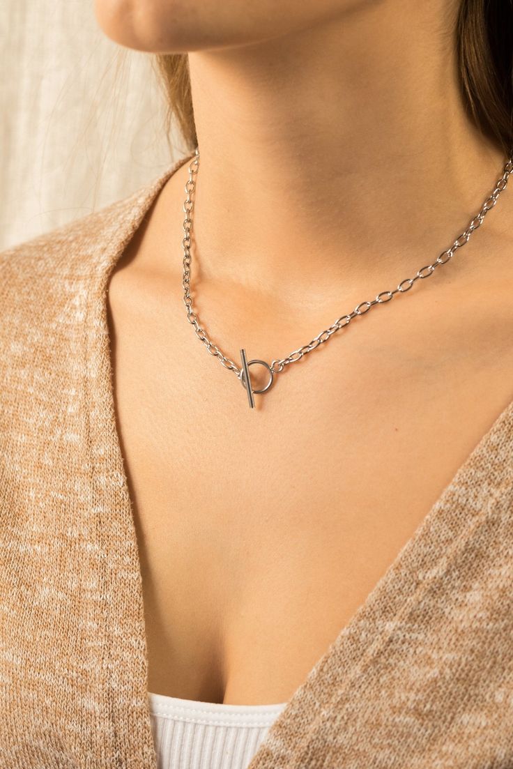 Description : Fall under the spell of Enora! The Enora necklace is distinguished by its delicacy and can be combined with the necklace of your choice. Make it a part of your collection. Product information : ● Stainless steel 316L● Waterproof● 40cm in length● 1mm in thickness of the pendant Delivery : Free Worldwide Shipping is included in the price. Gift Pendant Toggle Necklace, Spiritual Stainless Steel Clavicle Chain Necklace, Spiritual Stainless Steel Clavicle Necklace, Delicate Chain Link Toggle Necklace For Gift, Gift Toggle Necklace With Delicate Chain, Silver Spiritual Clavicle Chain Necklace, Stainless Steel Choker Chain Necklace For Gift, Stainless Steel Choker Chain Necklace As Gift, Stainless Steel Choker Chain Necklace Gift