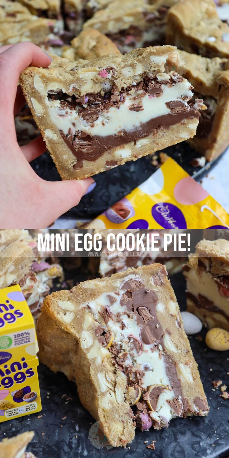 a hand holding up a cookie bar with chocolate and marshmallows