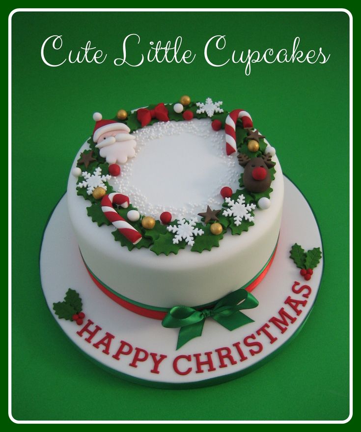 a cake decorated with christmas decorations and the words cute little cupcakes