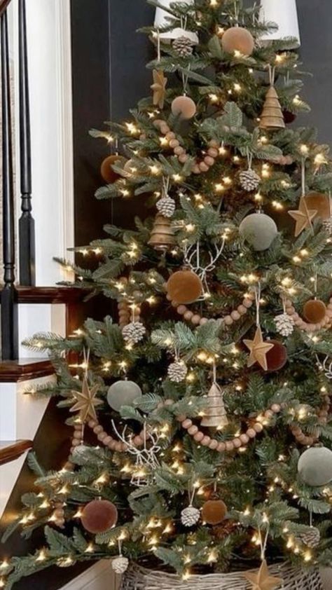 a decorated christmas tree with lights and ornaments