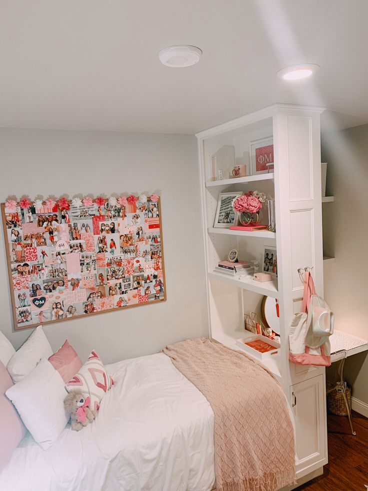 a bedroom with a bed, desk and bookcase in the corner on the wall