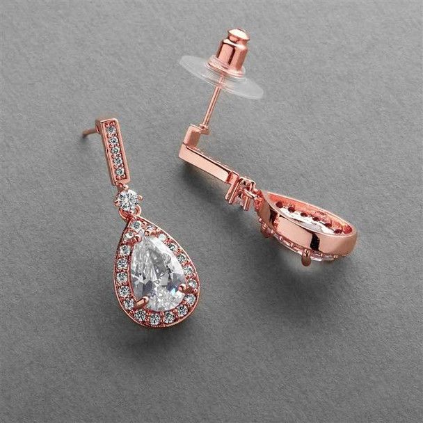 Rose%20Gold%20Cubic%20Zirconia%20Earrings%0D%0AThese%20dainty%20designer%20bridal%20earrings%20are%20dazzling%20with%20brilliant%20teardrop%20CZ%20crystals%20set%20in%20blush%20rose%20gold%20surrounded%20by%20glistening%20Cubic%20Zirconia%20pave%20frames.%26nbsp%3BA%20beautiful%20accessory%20for%20the%20modern%20bride%20or%20her%20bridesmaids.%0D%0ASize%3A%201%201%2F8%22%20long%20x%207%2F16%22%20wide.%0D%0AColor%3A%20Rose%20Gold.%0D%0AStyle%3A%204058E-RG.%0D%0ANeed%20several%20pair%20of%20earrings%20for%20your%20wedding%20party%3F%20You%20can%20buy%20in%20bulk%20and%20save!%0D%0APlease%20allow%201%20week%20for%20delivery.%0D%0AShipping%20Policy.%0D%0AReturn%20Policy Drop Bridal Earrings, Formal Earrings, Jewelry Showcase, Bridal Earrings Drop, Prom Earrings, The Modern Bride, Blush Rose, Jewelry Showcases, Cubic Zirconia Earrings