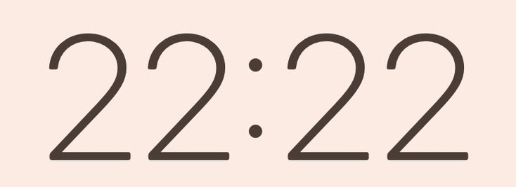 the numbers 22 22 are displayed in black and white on a light pink background,