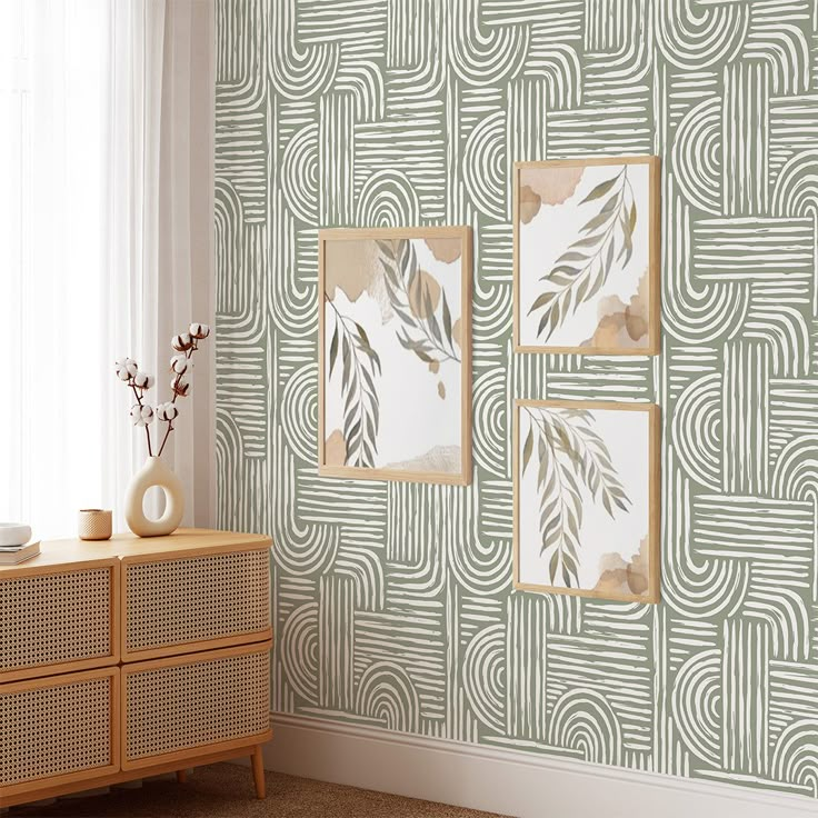 a living room with wallpaper that looks like art deco style paintings on the wall