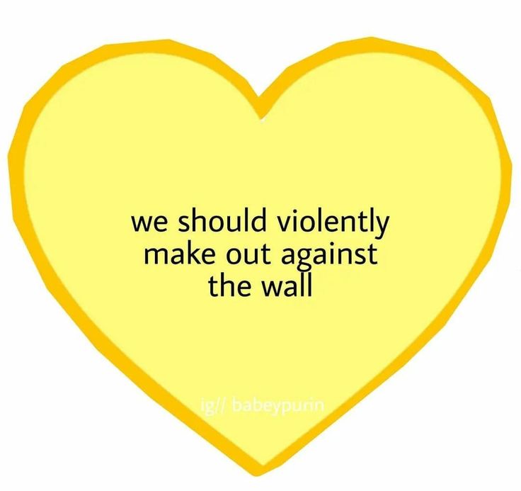 a yellow heart with the words we should be violently make out against the wall