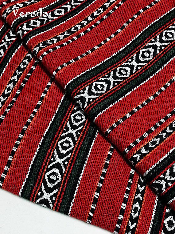 a red and black tie with white designs on it