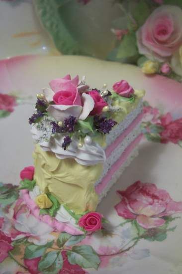 there is a piece of cake with flowers on it