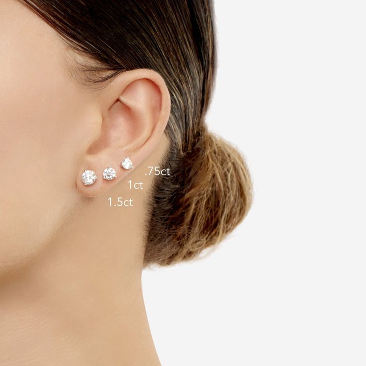 Our classic diamond studs are mounted in a sleek white gold setting. We hand select each diamond to guarantee they are eye-clean of any visible flaws and have maximum brilliance! Carat weights listed on model images are per pair. *This item is excluded from all promotional discounts. 1 Carat Diamond Earrings, Diamond Ear Cuff, Ring Concierge, Necklace Length Guide, Bracelet Size Chart, Diamond Huggies, Model Images, Basket Setting, Diamond Heart Ring