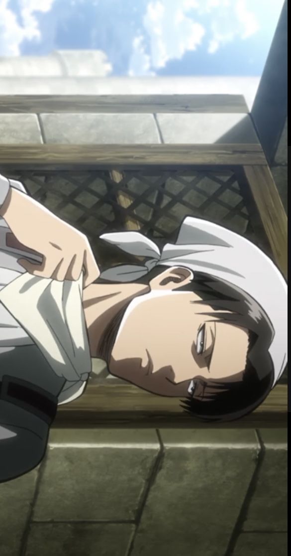 an anime character laying on the ground with his head down and hands behind his back