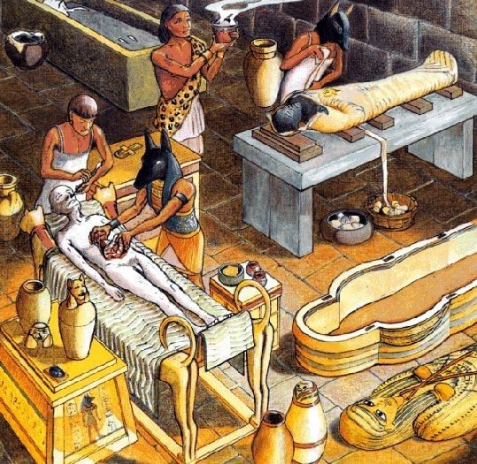 an image of people working in a factory with pottery on the table and other items