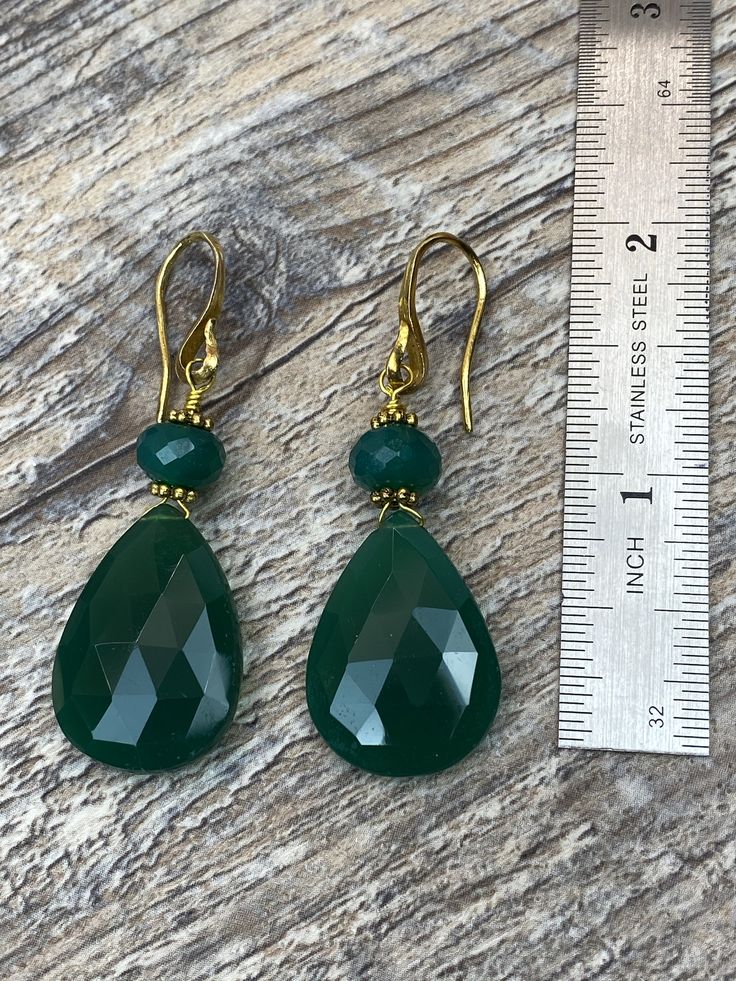 Faceted briollate pear shape Green onyx earrings beautiful gift, very Elegant, rich color of green May birthstone, beautiful dark faceted green Emerald onyx Emerald green onyx is the birthstone of May. the symbol of love, hope and harmony Beautiful rich color. Beautiful quality Product Details ◈ Handmade in the U.S.A. ◈ Gold filled finding and gold over 925 silver hook earrings ◈ Emerald Green onyx: 23x17.5 mm natural gemstones beautiful deep green color and 8.5mm emerald green onyx beads ◈ face Faceted Teardrop Dangle Earrings As Gift, Faceted Teardrop Dangle Earrings For Gift, Classic Teardrop Earrings For May Birthstone, Gift Teardrop Dangle Earrings With Faceted Details, Classic Teardrop May Birthstone Earrings, Faceted Pear-shaped Earrings For Gift, Faceted Teardrop Earrings As Gift, Faceted Drop Teardrop Earrings For Gift, Faceted Teardrop Earrings For Gifts