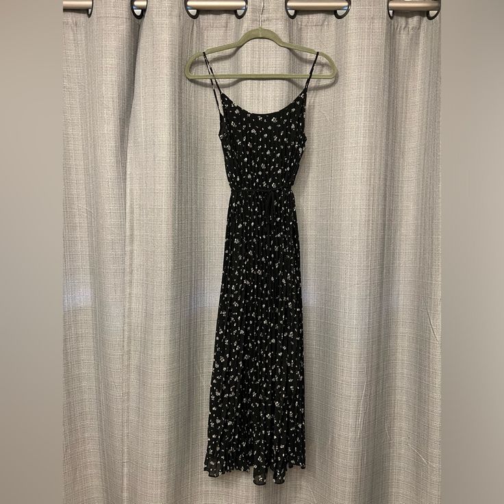 Never Worn. No Tags. H&M. Black Summer Maxi Dress With White Flowers. Excellent Condition. No Smoking. No Pets. Pleated. Tie Around The Waist. Xs Black Maxi Dress With Floral Print, Spaghetti Straps, H&m Sleeveless Maxi Dress For Day Out, Sleeveless H&m Maxi Dress For Day Out, H&m Black Midi Dress For Night Out, Casual Sleeveless Midi Dress By H&m, H&m Casual Sleeveless Midi Dress, Fitted Floral Print Maxi Dress By H&m, H&m Casual Flowy Maxi Dress, Casual Black Midi Dress From H&m