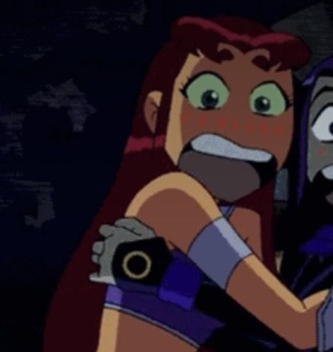 two cartoon characters hugging each other in the dark