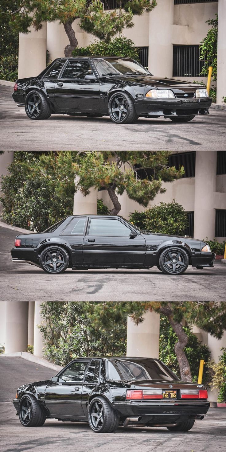 three different cars parked next to each other in front of a building