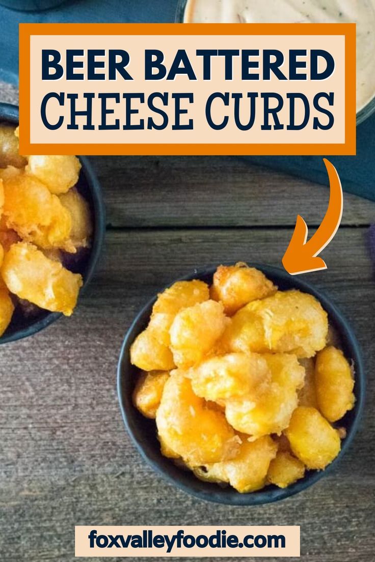 two small bowls filled with batter and cheese cubes