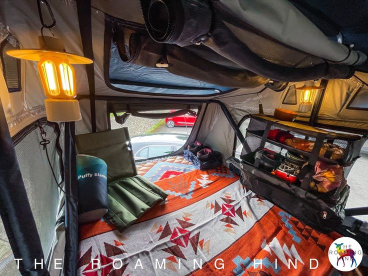 the inside of a camper with its lights on