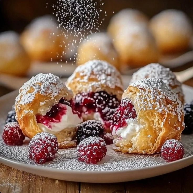 Cream and Berry-Filled Pastry Balls - cooking art Pastry Balls Desserts, Berry Filled Pastry Balls, Berries And Cream Pastry, Irresistible Cream And Berry-filled Pastry Balls, Christmas Desserts Fancy Individual, Cream And Berry Pastry Balls, Gourmet Christmas Appetizers, Sugar Plum Dessert, Cream And Berry Filled Pastry Balls