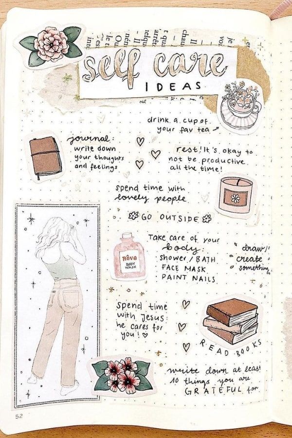 an open notebook with some drawings and writing on it, including the words self care ideas