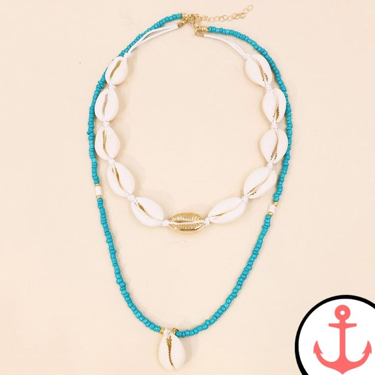 Introducing the Shell Beaded Necklace: A Treasure of the Sea Take a journey into the enchanting world of the ocean with our exquisite Shell Beaded Necklace. Designed for passionate sea lovers like you, this mesmerizing piece of nautical jewellery captures the essence of the sea's natural beauty. Whether you're strolling along the beach or attending a special occasion, this necklace will effortlessly elevate your style to new depths. As part of our Shell necklace collection, the Shell Beaded Neck Nautical Style Adjustable Jewelry For Beach, Adjustable Nautical Jewelry For Beach, Ocean-inspired Blue Shell Jewelry, Shell-shaped Beaded Necklaces For Beach Season, Blue Shell Jewelry With Colorful Beads, Blue Strand Necklaces For Beach Season, Adjustable Polished Beads Necklace For Beach, Adjustable Polished Bead Necklaces For Beach, Gold Nautical Jewelry For Beach