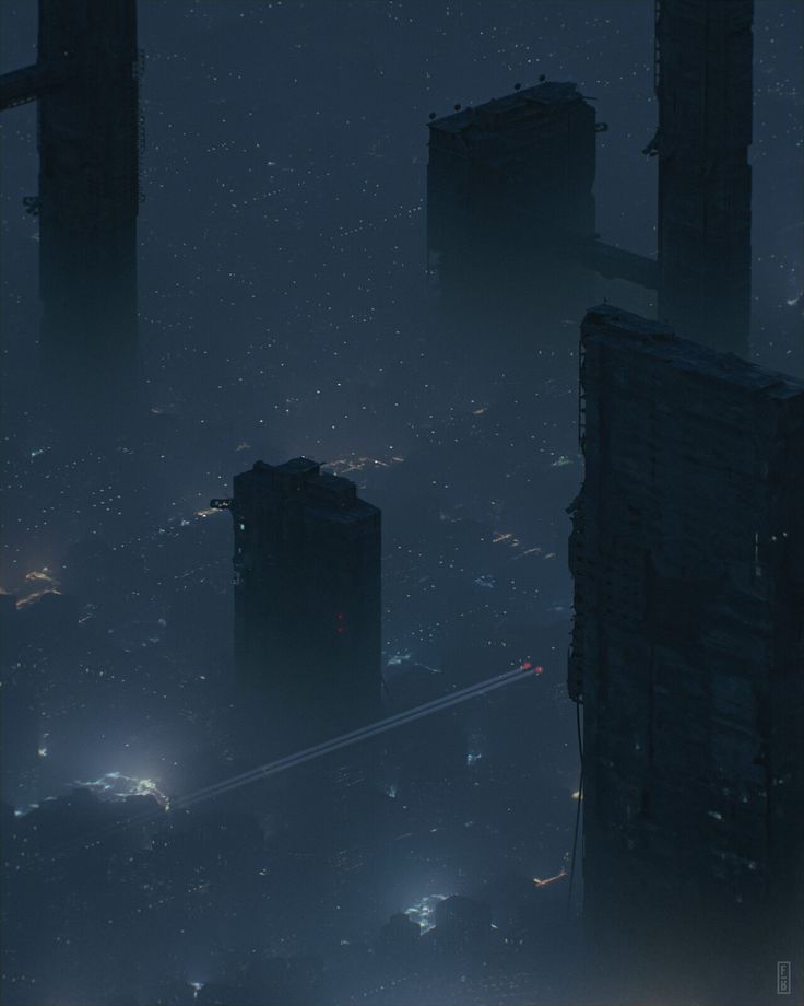 an aerial view of a city at night with lots of lights and buildings in the fog