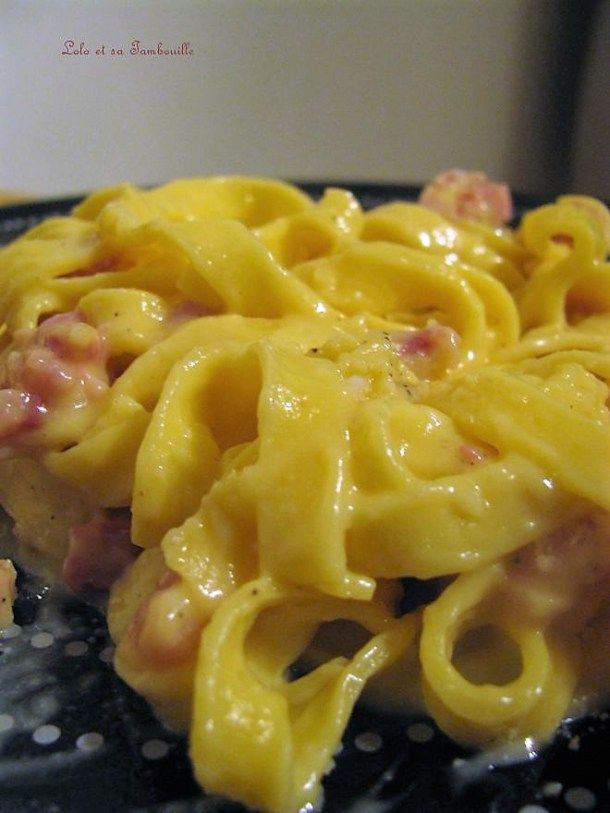 a plate with some pasta and meat on it