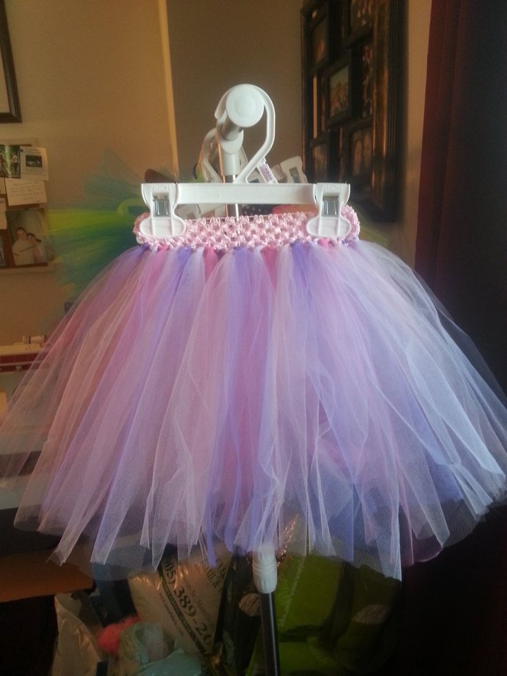 Child tutu will fit ages 1-5 2 shades of pink and 2 shades of purple combined for a fairy like tutu- pink band hangs 11" in length Price listed is for 11" length Single Layer For double layers please add $5 and contact directly to order All my items are custom made to order- To see on hand items that can be shipped the next day please visit www.facebook.com/tutusbyamber1/ Purple Princess Tutu Dress, Purple Princess Style Tutu Dress, Princess Style Purple Tulle Tutu Dress, Purple Tulle Tutu Dress For Birthday, Whimsical Pink Tutu Dress, Whimsical Pink Tutu Dress With Tulle Skirt, Whimsical Pink Tulle Tutu Dress, Pink Ballet Tutu Dress With Tulle Skirt, Purple Princess Tutu Dress For First Birthday