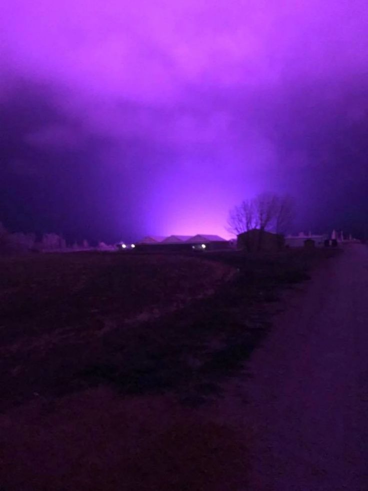 the sky is purple in color as it appears to be dark