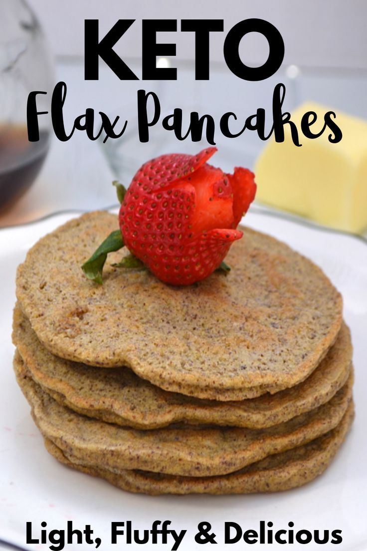 a stack of pancakes with a strawberry on top and the words keto flax pancakes light, fluffy & delicious