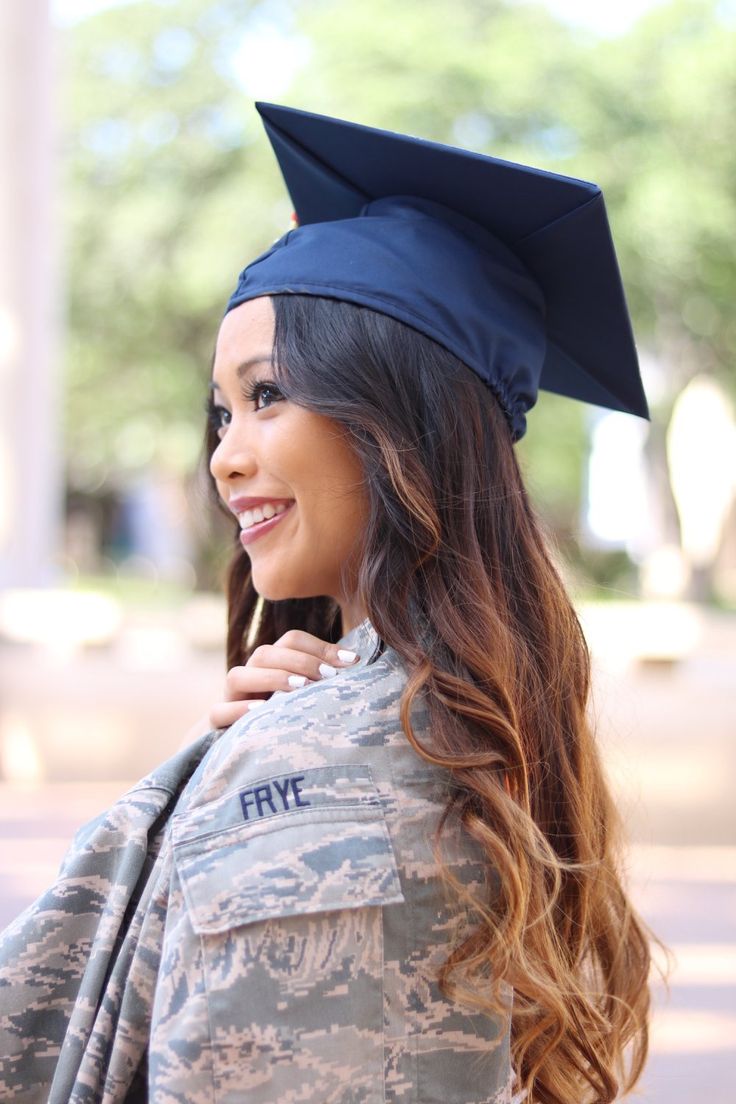 a woman wearing a graduation cap and gown