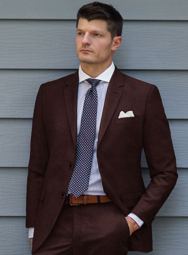 Ensure that your style shines at your next sophisticated soirée with the refined silhouette of our Scabal Wine Herringbone Wool Jacket. Expertly crafted from superfine merino wool, which lends an ultra-smooth and comfortable finish. The herringbone weave, intertwined with wine-colored cloth, delivers plenty of texture, adding interest and sophistication to a boardroom-ready look that can be worn repeatedly.  Look Includes    Scabal     Wine     Herringbone     Wool  Fabric  Two Button Jacket Sty Red Tuxedo, Herringbone Tweed Jacket, Herringbone Suit, Tweed Pants, Black Herringbone, Linen Suits, Herringbone Tweed, Blue Tweed, Tweed Suits