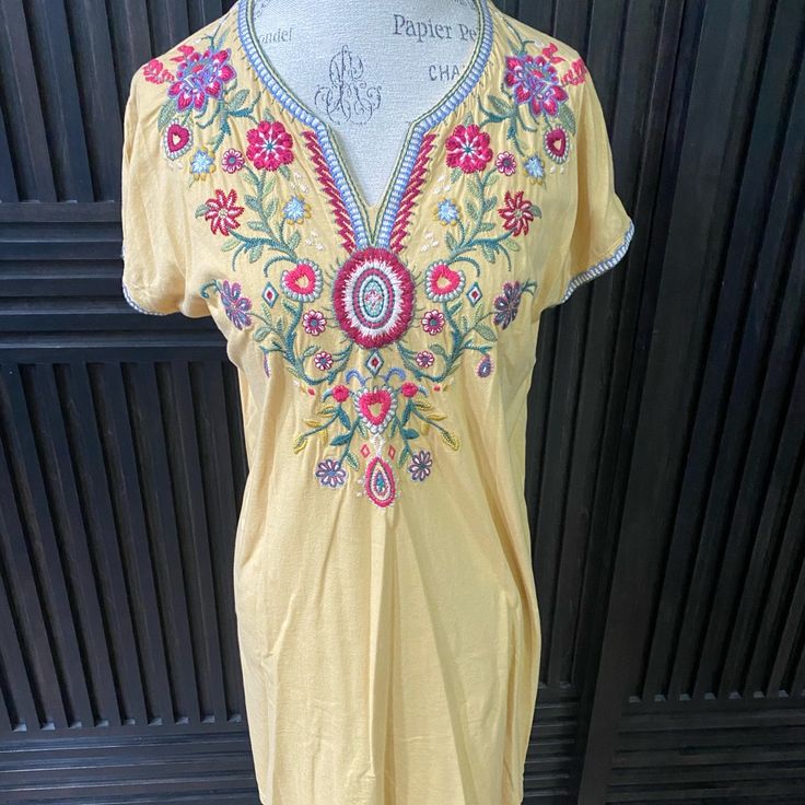 Beautiful Cotton Dress In A Light Yellow With Bright Embroidery. Comfy And Great To Throw On And Go. 34 Long And About 19 Bust Laid Flat. Nwt. Yellow Embroidered V-neck Dress, Yellow Embroidered Short Sleeve Dress, Yellow Embroidered Dress For Vacation, Yellow Bohemian Dress With Floral Embroidery, Yellow Floral Embroidered Dress For Spring, Embroidered Yellow Beach Dress, Yellow Cotton Dress With Floral Embroidery, Yellow Floral Embroidered Dress, Yellow Embroidered Dress For Summer