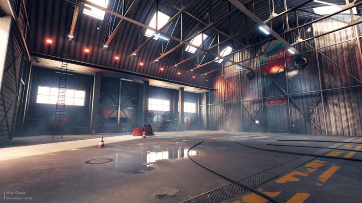 the inside of an industrial building with lots of windows and metal grates on the floor