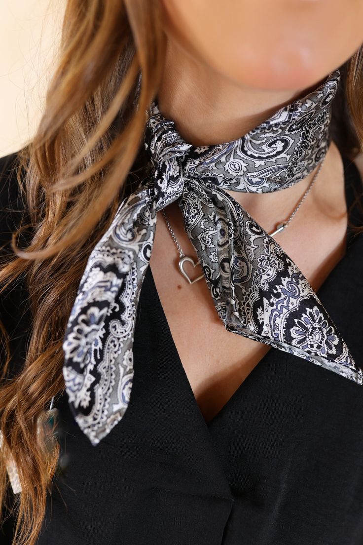 Our beautiful new line of wild rags are so fun and great for the upcoming seasons! Tie this in your hair, around your neck, or around your purse and you're set! This scarf is 100% silk. Size: Mini Wild rag measures 20 x 20 inches. SKU: #Mini Paisley-Black/Silver (1102-2009) Black Silk Scarf For Spring Gift, Wild Rag Ties, Bandana Print Silk Scarf As Gift, Silk Scarf With Bandana Print As Gift, Styling Wild Rags, Wild Rag Fashion, Womens Wild Rag Outfits, Black Bohemian Scarves With Bandana Print, Wild Rags