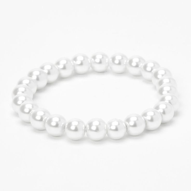 Claire's Classic Pearl Stretch Bracelet - White Elegant Stretch Bracelet With Pearl Charm And Round Beads, White Pearl Stretch Bracelet For Party, Elegant Beaded Pearl Stretch Bracelet, Elegant Pearl Beaded Stretch Bracelet, Adjustable Pearl Stretch Bracelet Elegant Style, Elegant Pearl Stretch Bracelet For Party, Elegant White Beaded Stretch Bracelet, Party Pearl Stretch Bracelet With Round Beads, Elegant Adjustable Stretch Bracelet With Pearl Charm