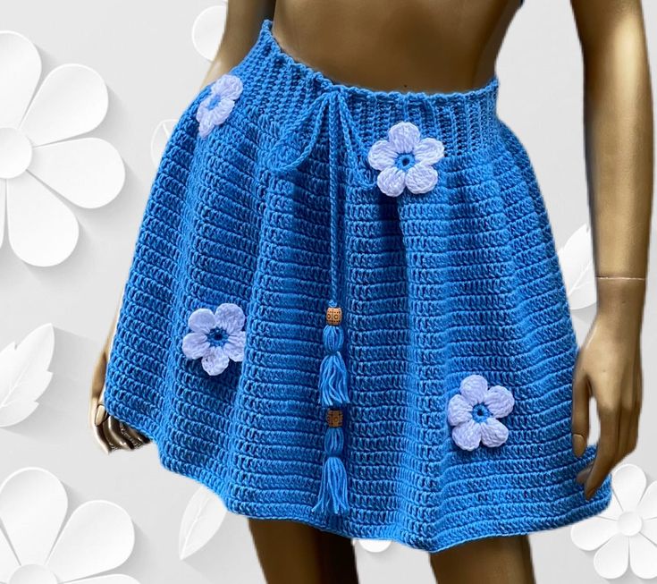 "If you don't have paypal, you can purchase the pattern on my website https://shylercrochets.com/shop/patterns/crochet-circle-ruffle-mini-skirt/ Elevate your crochet skills with the Crochet Circle Skirt pattern / Crochet Ruffle Skirt, brought to you by the renowned ShylerCrochets. Transform your closet with this delightful mini skirt that adds a touch of charm and playfulness to any outfit. With a well-crafted written pattern at your fingertips, you'll effortlessly master the art of crocheting t Spring Crochet Mini Skirt, Handmade Mini Skirt For Summer, Spring Mini Skirt With Crochet Details, Crochet Mini Skirt For Beach, Crochet Circle Skirt, Crochet Wrap Skirt, Skirt Pattern Crochet, Crochet Ruffle Skirt, Mini Skirt Pattern