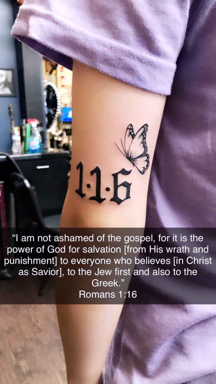 a person with a tattoo on their arm that says, i am not attached to the god