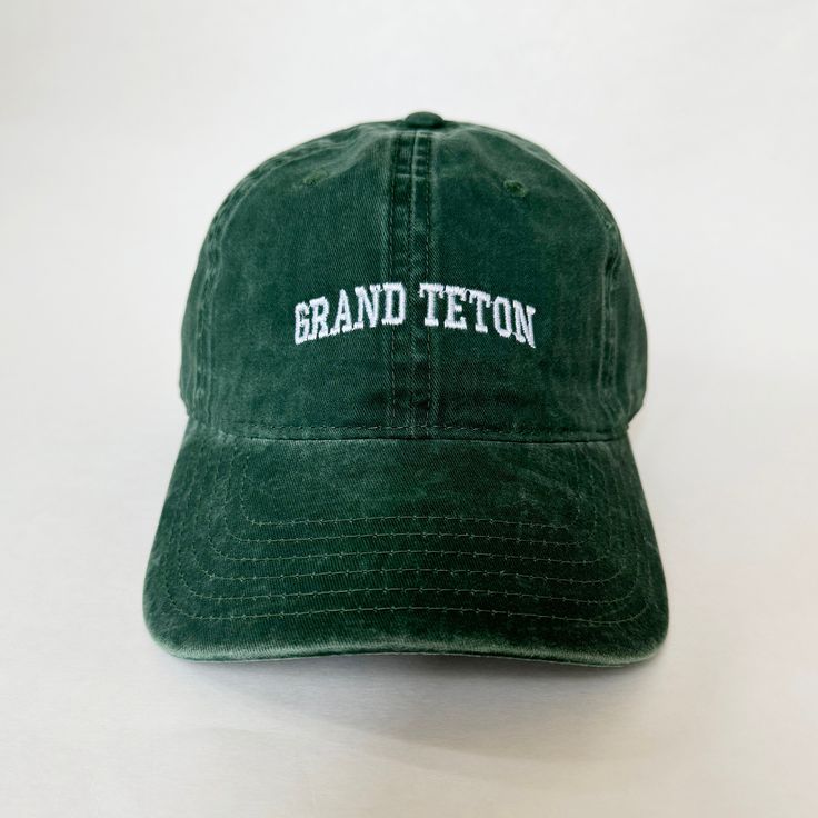 100 % Cotton.  One size fit most with an adjustable buckle strap closure, fitting up to XL size. Crown measures 3 1/2 inches deep. Bill measures 2 3/4 inches long. Adult / Unisex  Thick, Soft, and light material. Hand wash only. Very nice quality-built hats with quality embroidery work. Green Casual Baseball Cap For Travel, Casual Green Baseball Cap For Travel, Green Embroidered Baseball Cap For Outdoor, Adjustable Hats For Baseball Season, Adjustable Green Hat With Embroidered Logo, Outdoor Curved Brim Baseball Cap With Embroidered Logo, Adjustable Green 5-panel Dad Hat, Green Adjustable 5-panel Dad Hat, Adjustable Outdoor Hat With Embroidered Logo