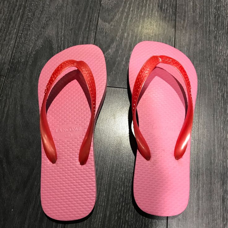 Brand New Lancme Flip Flops Soles Are A Bright Pink And The Straps Are A Dark Pink / Reddish Color Casual Red Toe Post Flip Flops, Casual Red Non-slip Flip Flops, Spring Red Non-slip Flip Flops, Red Round Toe Flip Flops For Beach, Red Round Toe Flip Flops For Summer, Red Non-slip Synthetic Flip Flops, Red Synthetic Beach Slippers, Pink Non-slip Flat Flip Flops, Red Flat Summer Flip Flops