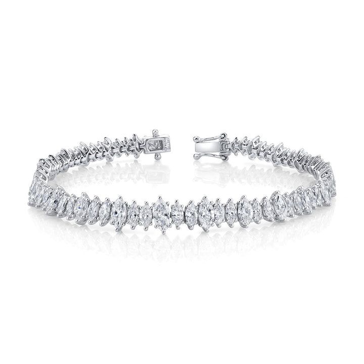 18k gold marquise diamond tennis bracelet6.08cts marquis diamonds 6.5 inches in length. Shown with Atlas diamond bracelet & Hepburn bracelet with shield cut diamond center.  #AKMQTB- Luxury Marquise Diamond Bracelet With Brilliant Cut, Luxury Marquise Brilliant Cut Diamond Bracelet, Luxury Diamond Bracelet With Marquise Cut, Luxury Marquise Diamond Cut Bracelets, Luxury Marquise Cut Diamond Bracelet For Formal Events, Luxury Marquise Cut Diamond Bracelet For Formal Occasions, Luxury Marquise Diamond Tennis Bracelet, Luxury Diamond Bracelet Marquise Cut, Formal Marquise Diamond Bracelet With Diamond Accents