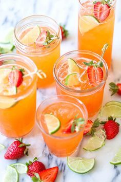 strawberry pineapple mojito with limes and strawberries