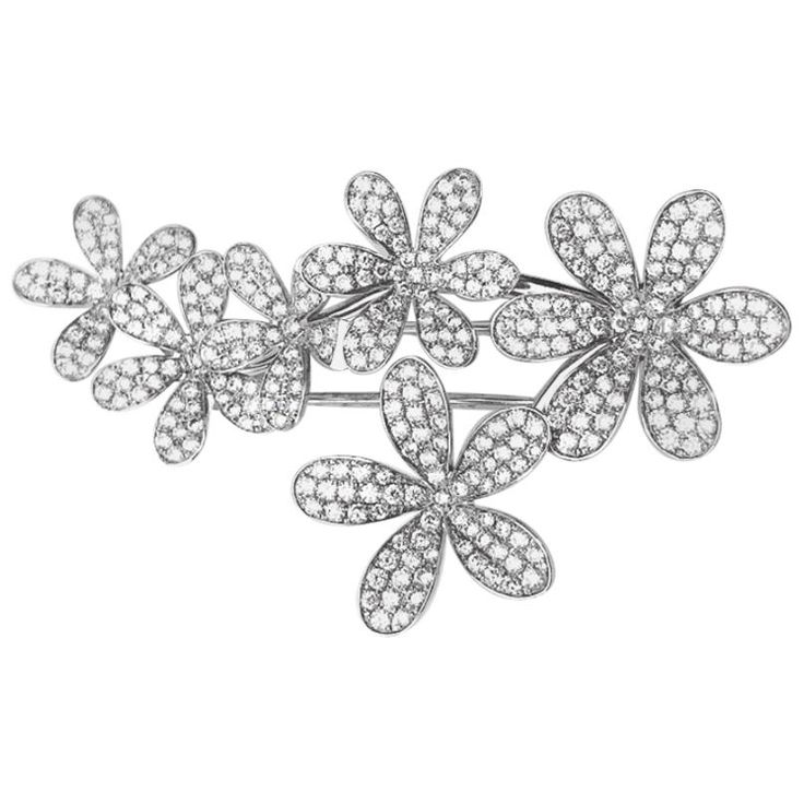 This elegant 18 karat white gold brooch, by Stenzhorn, has been designed with six flowers set with pave diamonds. The brooch measures 2 1/2 in length x 1 3/8". Stamped 750 Total Diamond weight 3.20 carats Gold Brooch, Antique Brooches, Gold Brooches, Pearl Brooch, Diamond Flower, Antique Diamond, Flower Pins, Lovely Jewellery, Lotus Flower Tattoo