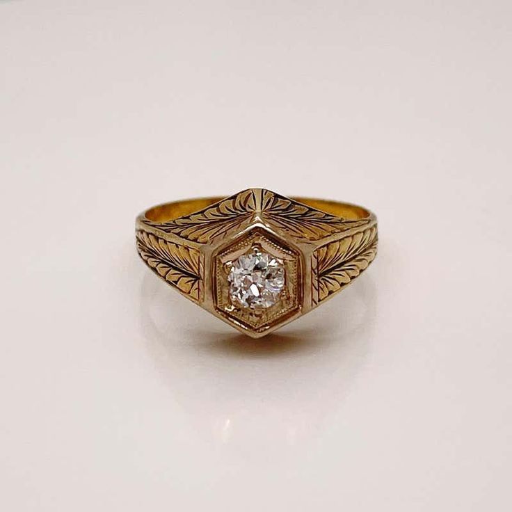 For Sale on 1stDibs - A very fine antique engraved 14k gold and diamond ring. With a lovely ca. 0.24 ct. Old European cut diamond (Color: G /Clarity: I1) set at the center of Formal Diamond Jewelry With Engraving, Formal Engraved Diamond Jewelry, Heirloom 14k Gold Diamond Ring With Rose Cut, Antique Diamond Cut Signet Ring For Anniversary, Vintage Engraved Rings For Formal Occasions, Antique Yellow Gold Wedding Ring With Rose Cut Diamonds, Vintage Oval Engraved Diamond Ring, Vintage Engraved Oval Diamond Ring, Antique Signet Ring For Anniversary