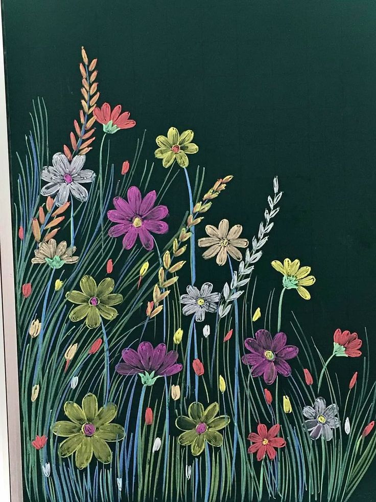 a painting of flowers and grass on a black background