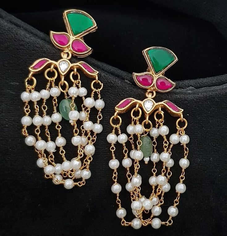 Jadau Kundan Earrings Perfect fusion of tradition and luxury Earrings Unique design at amazing ideal earrings Elegant Chandbali Temple Jewelry Earrings, Chandbali Temple Jewelry Earrings With Elegant Design, Traditional Elegant Earrings For Festivals, Traditional Elegant Danglers For Celebration, Traditional Danglers For Celebration With Elegant Design, Elegant Chandbali Earrings With Dangling Beads, Elegant Plug Earrings For Festive Celebration, Festive Fusion Dangling Beads Earrings, Elegant Festive Celebration Plug Earrings